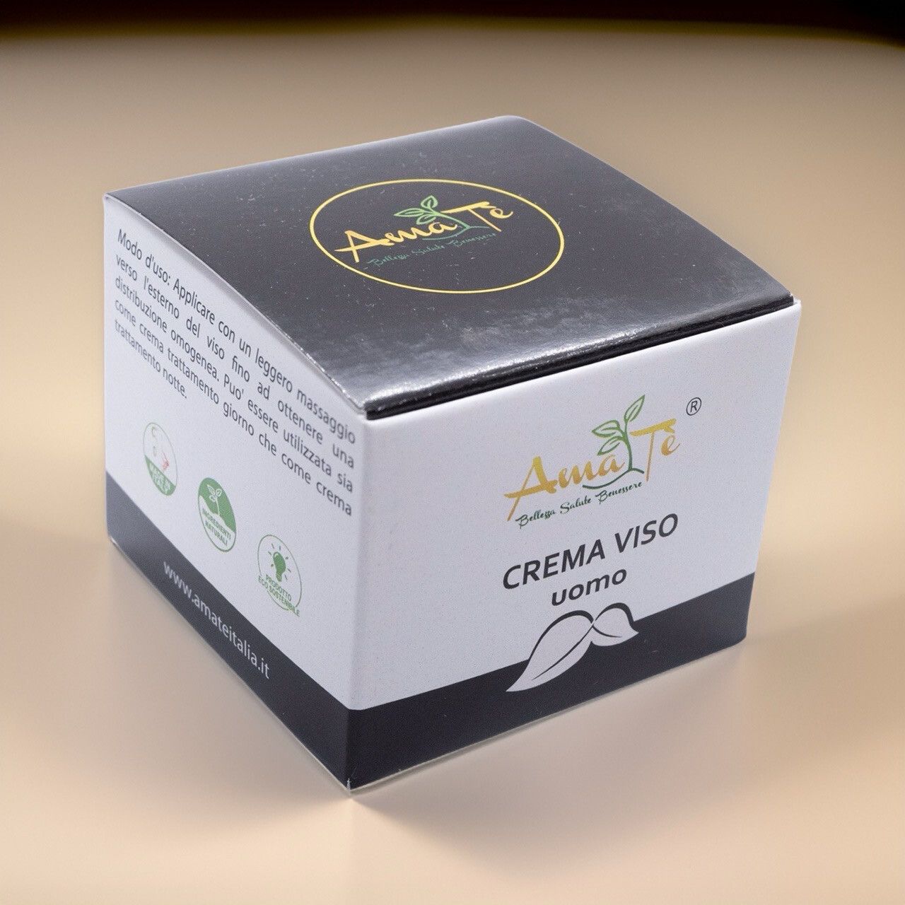Scatola quadrata. Bianco e nero con logo e testo: "CREMA VISO uomo".