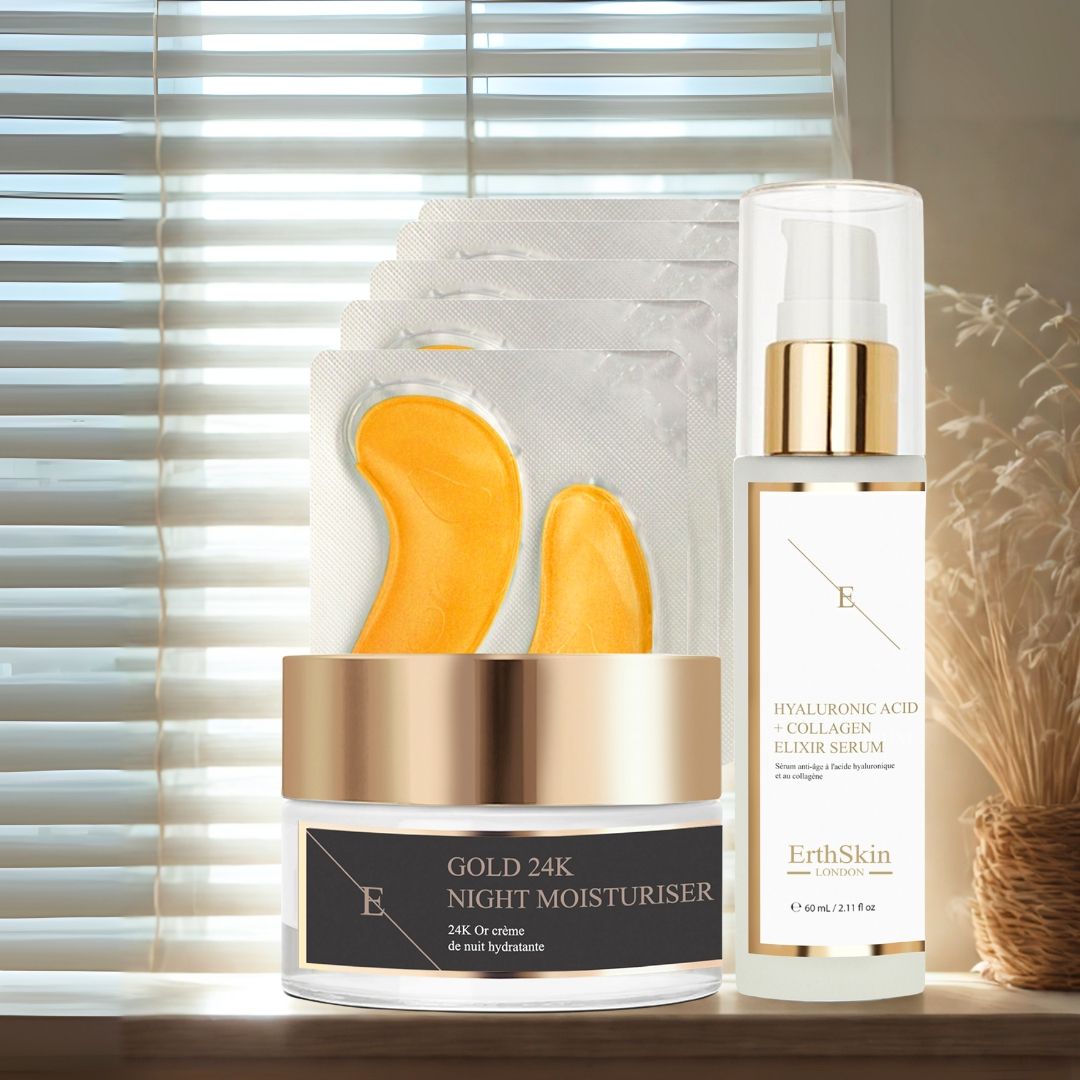 Set con crema notte, patch occhi e siero. Prodotti su davanzale. Flaconi crema e siero con dettagli dorati.