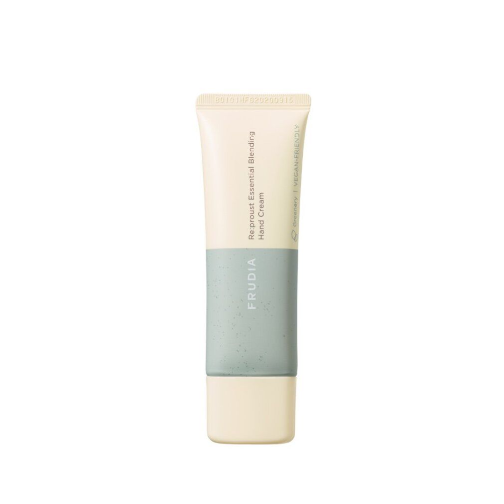 Tubo di crema per le mani, beige e verde chiaro, con testo stampato.