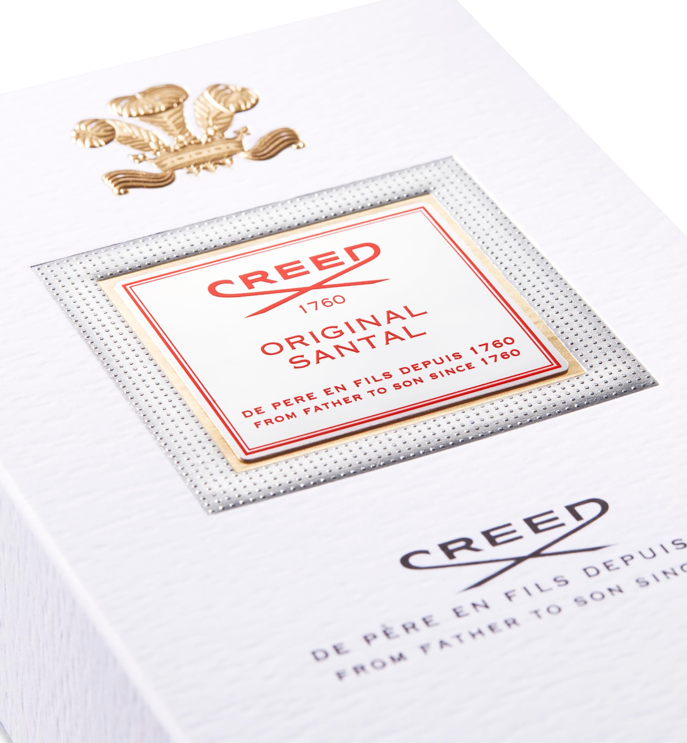 Scatola bianca con stemma dorato e scritta: CREED ORIGINAL SANTAL.