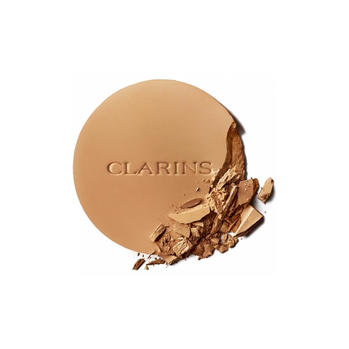 Cipria compatta rotonda marrone con scritta CLARINS. Parte rotta.