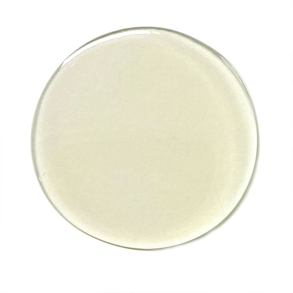 Goccia di olio detergente idratante al riso nero.