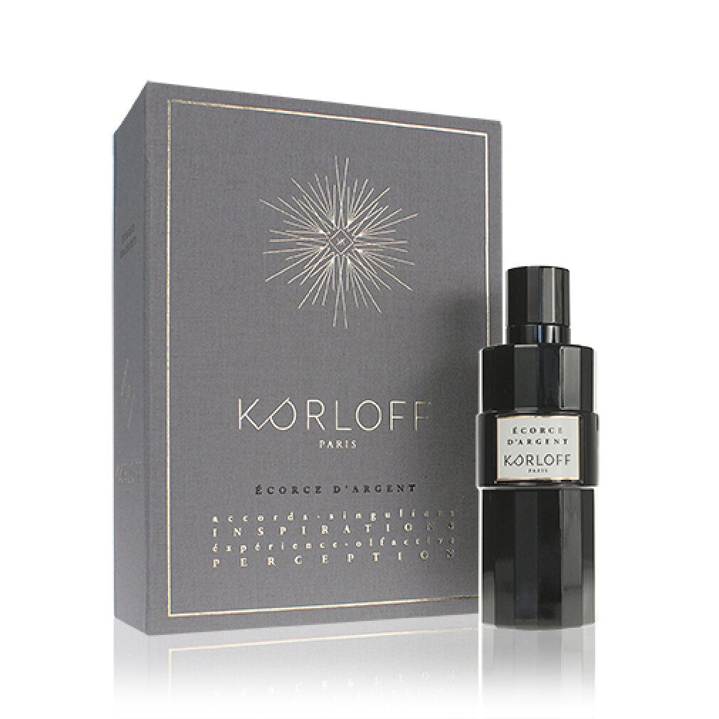 Scatola grigia con flacone. Scritta: KORLOFF PARIS, ÉCORCE D'ARGENT. Flacone: nero, superficie scanalata, etichetta bianca.