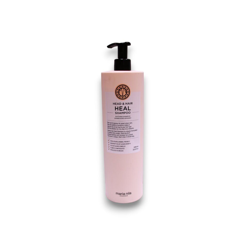 Flacone di shampoo beige con dosatore nero. Scritta: HEAD & HAIR HEAL SHAMPOO. Marchio: Maria Nila.