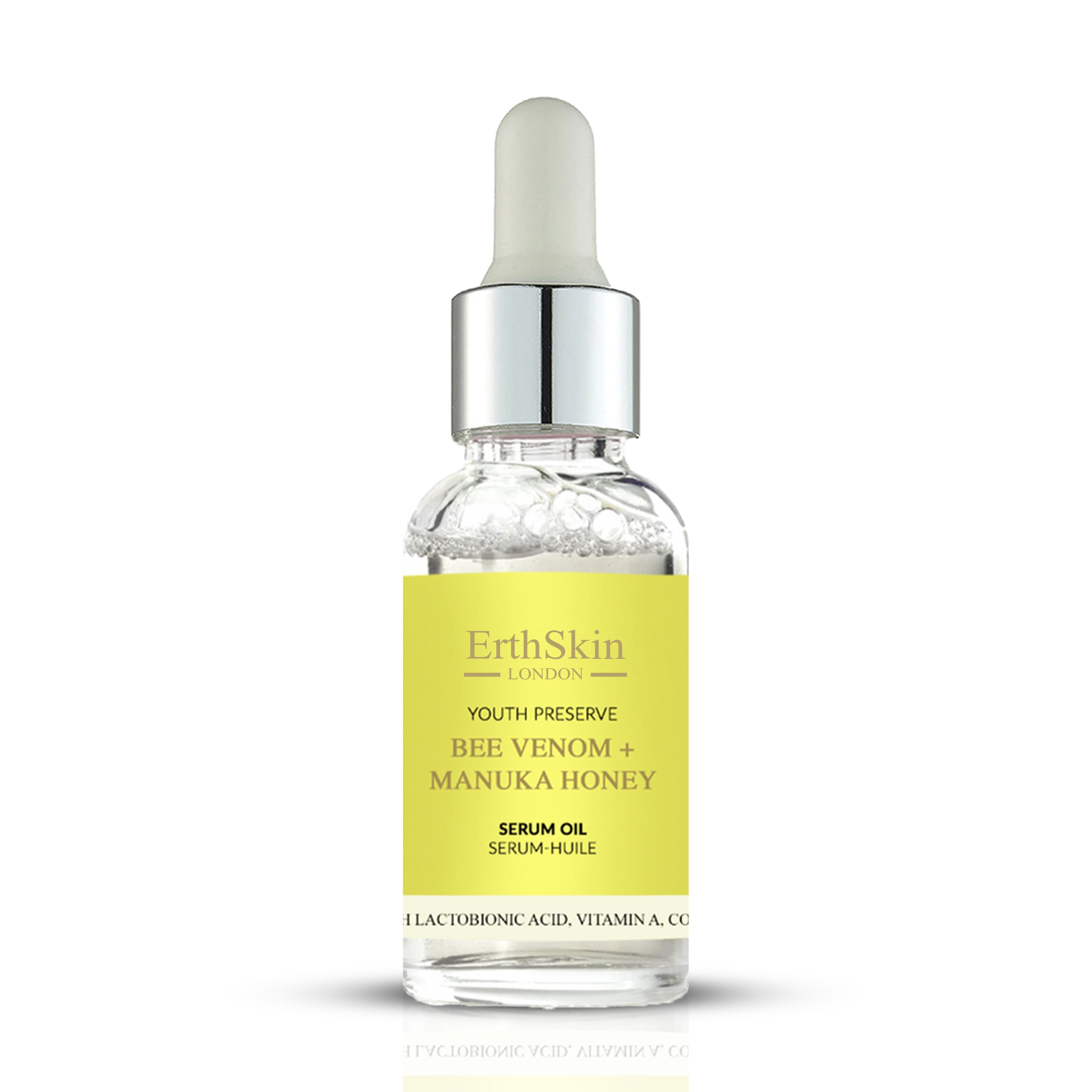 Flacone di siero ErthSkin London con etichetta gialla. Contiene veleno d'api e miele di Manuka. Con pipetta.