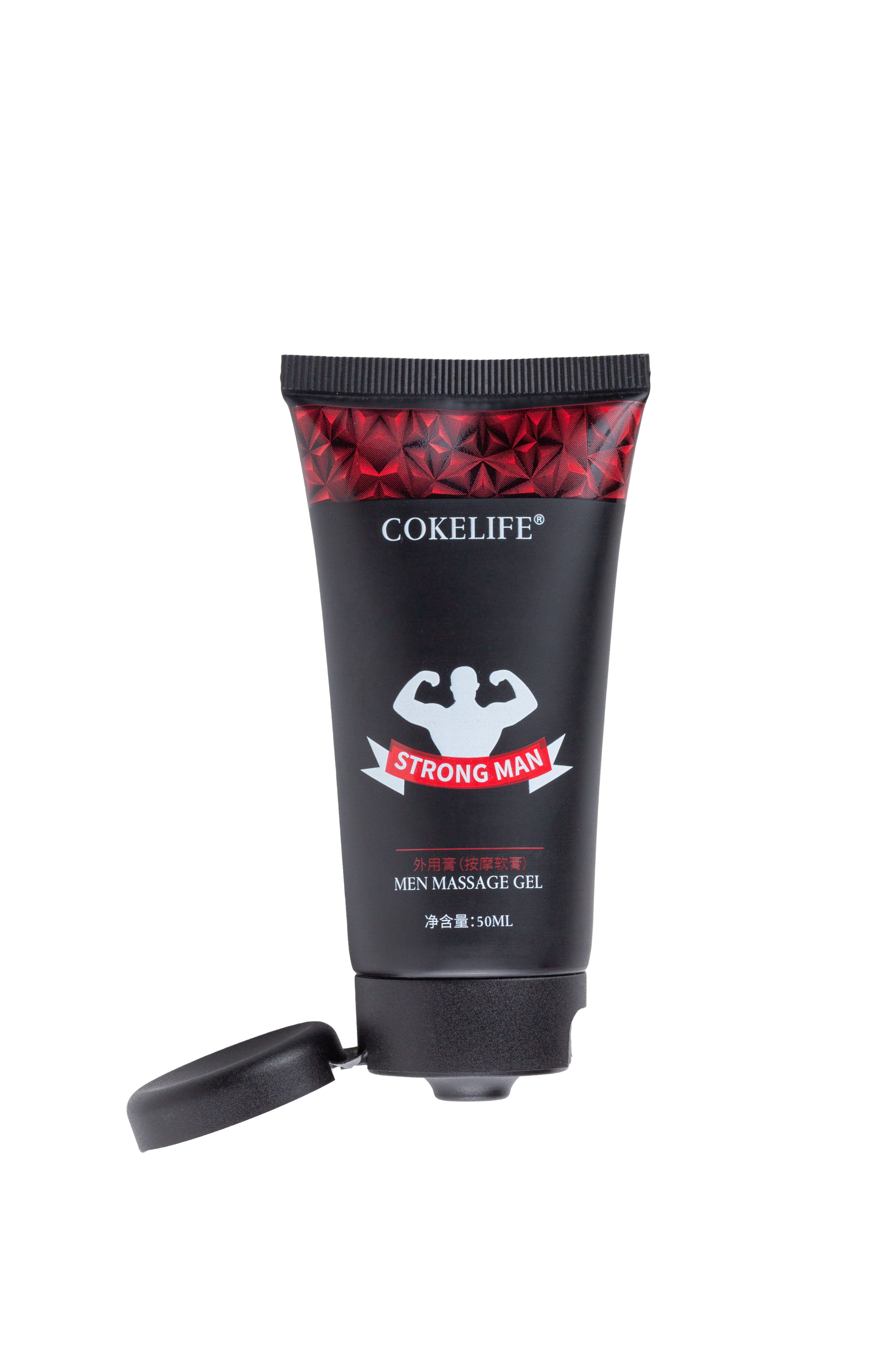 Tubo nero con motivo rosso e scritta. Tappo aperto. Testo: COKELIFE, STRONG MAN, MEN MASSAGE GEL.