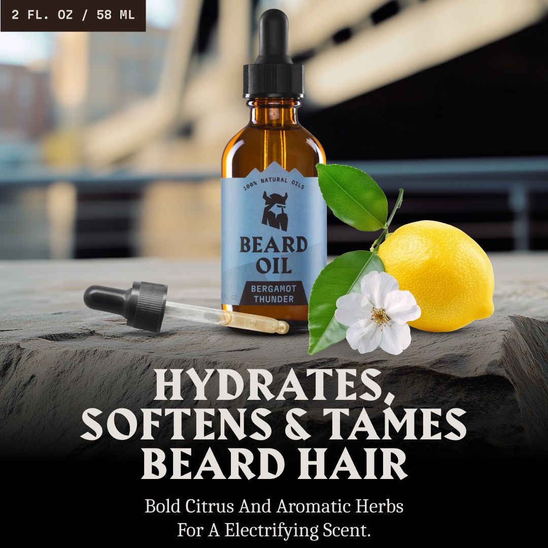 Flacone di olio da barba con contagocce, limone e fiore su pietra. Testo: Idrata, ammorbidisce e doma la barba.