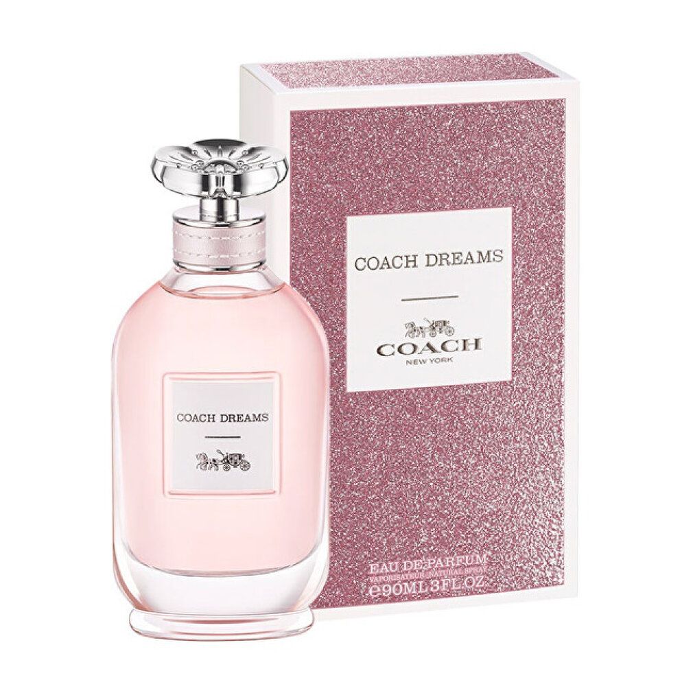 Flacone in vetro rosa con tappo argentato e confezione. Scritta "COACH DREAMS" e logo carrozza. Confezione glitterata.