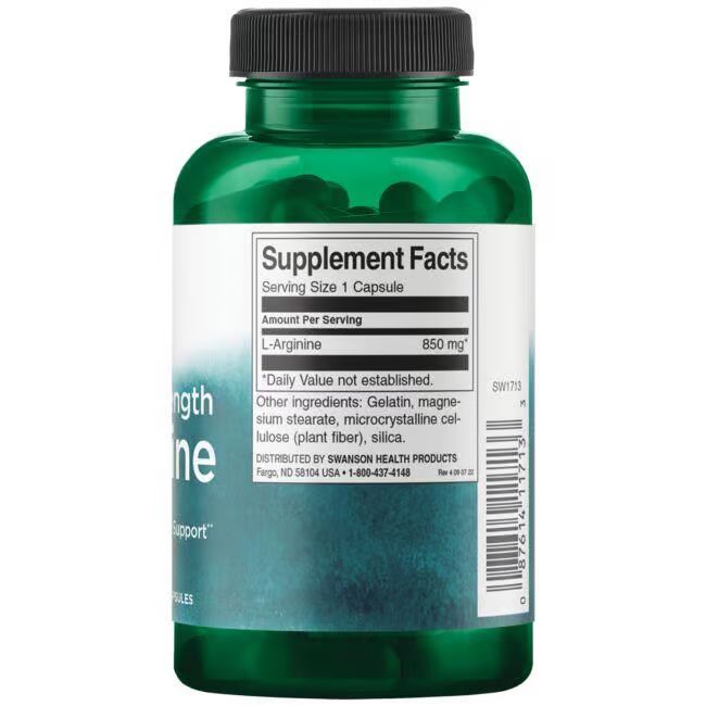 Retro di una bottiglia verde. Etichetta con informazioni nutrizionali: L-Arginina 850 mg. Altri ingredienti e informazioni produttore.
