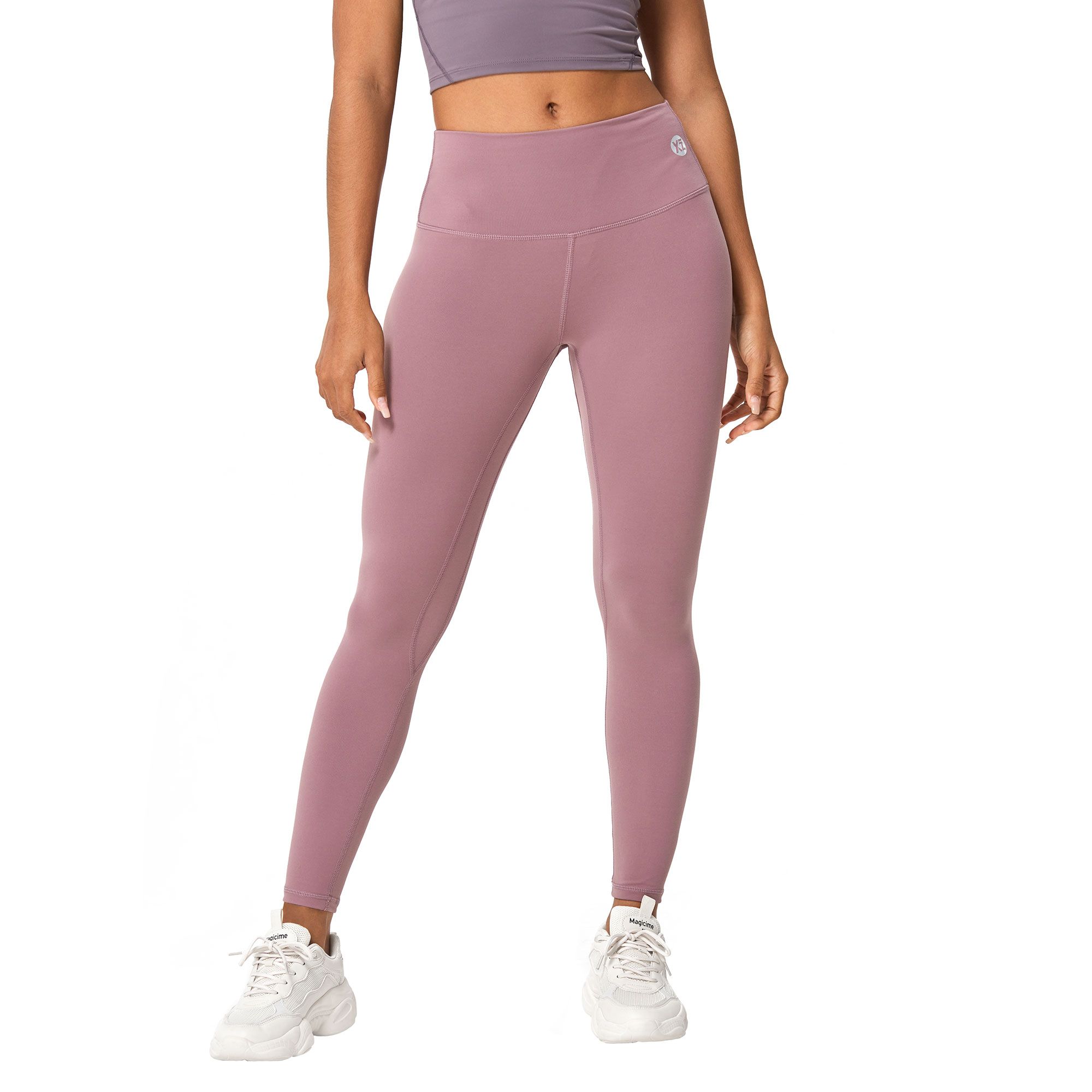 Leggings da allenamento rosa a vita alta con logo bianco sull'anca sinistra.