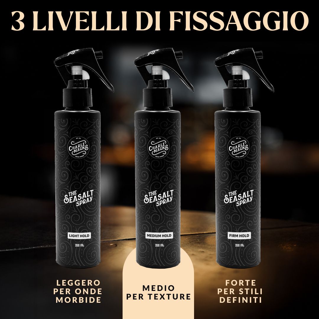 Tre flaconi spray neri di prodotti per capelli, che offrono tre diversi livelli di tenuta.