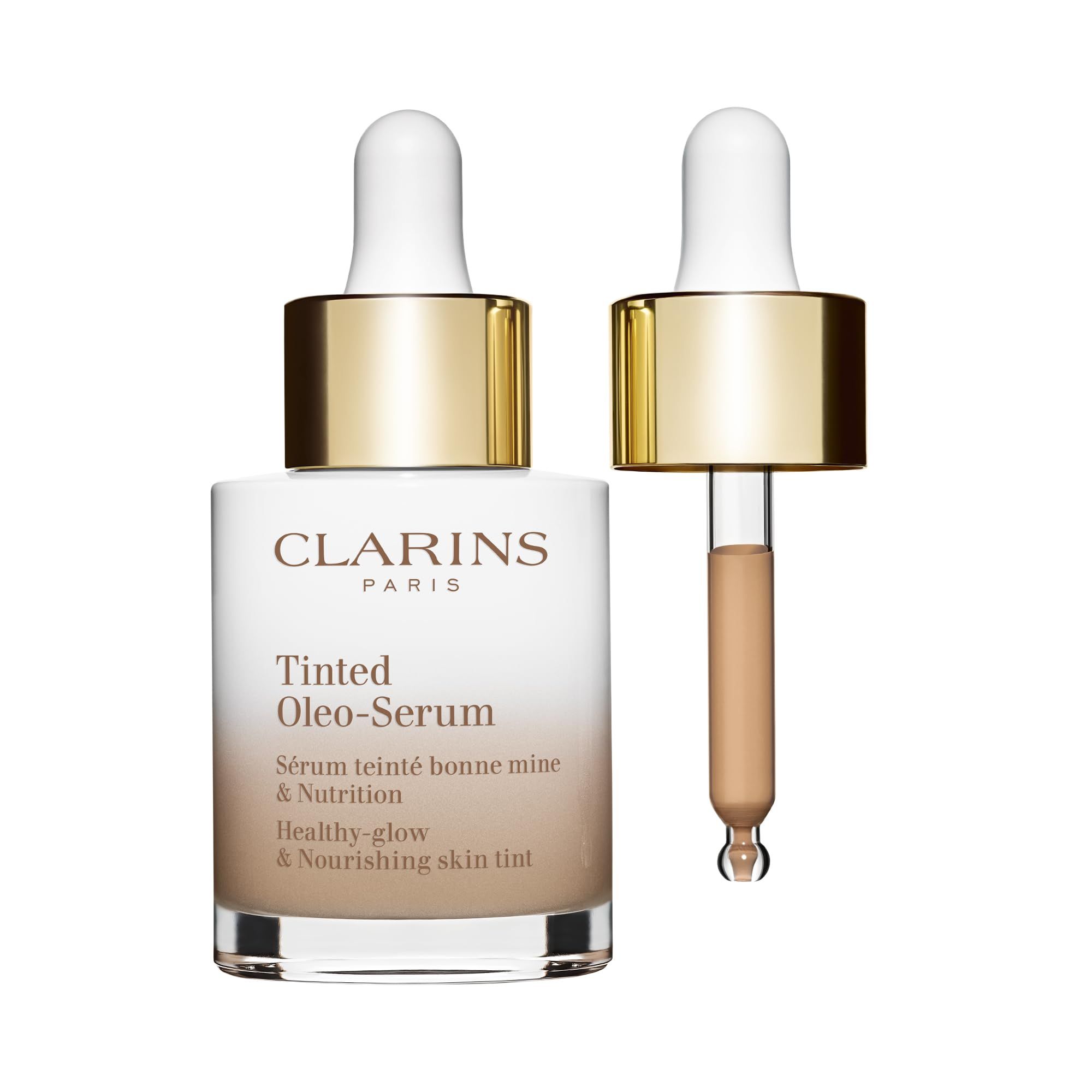Flacone di siero con pipetta. Sfumatura bianco-marrone. Tappo dorato. Pipetta con siero. Scritta: Clarins, Tinted Oleo-Serum.