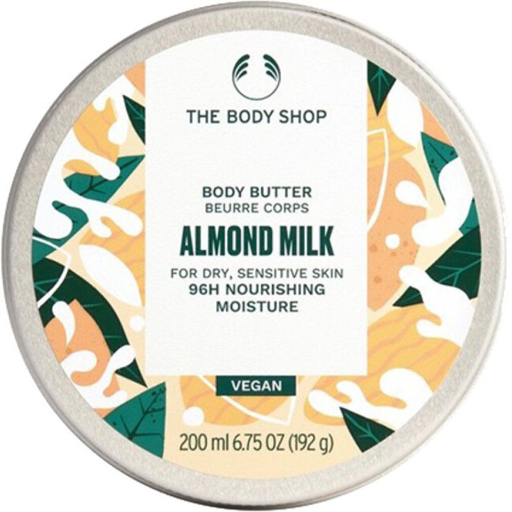 Barattolo rotondo con coperchio. Scritta: The Body Shop, Body Butter Almond Milk. Per pelli secche e sensibili. Vegano. 200 ml.