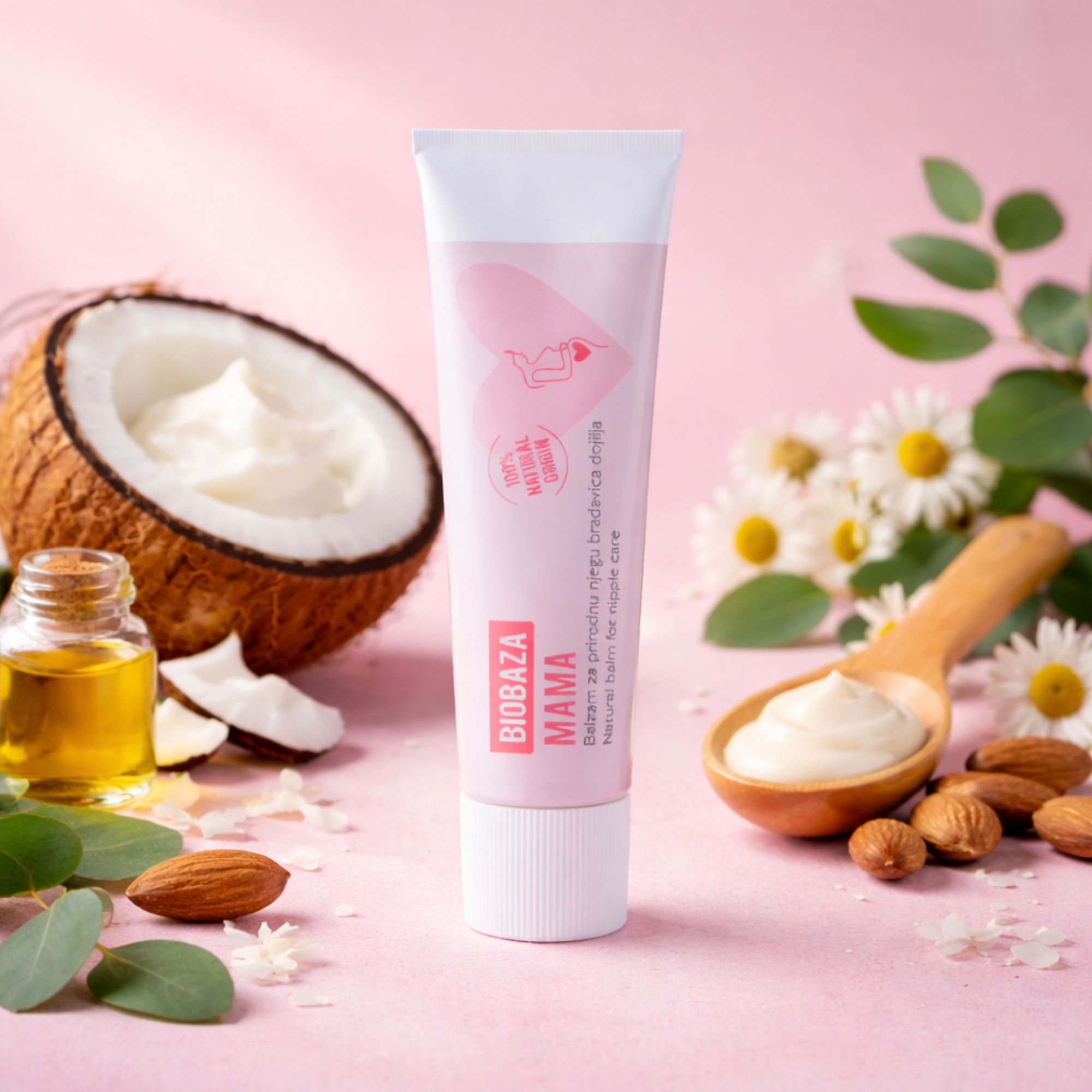 Tubo rosa con tappo bianco. Scritto: Biobaza Mama, balsamo per capezzoli. Cocco, olio, mandorle e crema.