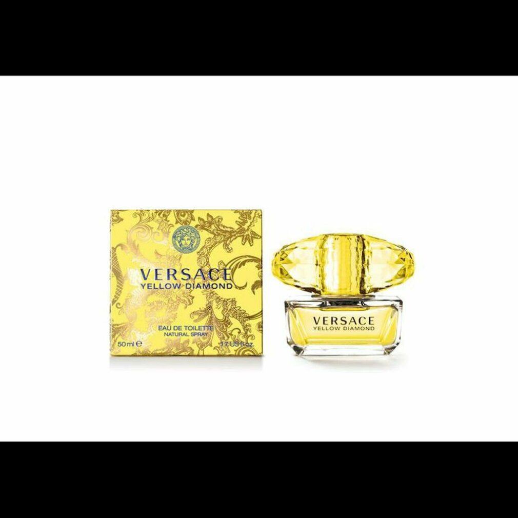 Flacone e scatola di profumo gialli. Scritta: Versace Yellow Diamond. Flacone con tappo giallo. Scatola con logo e scritta.