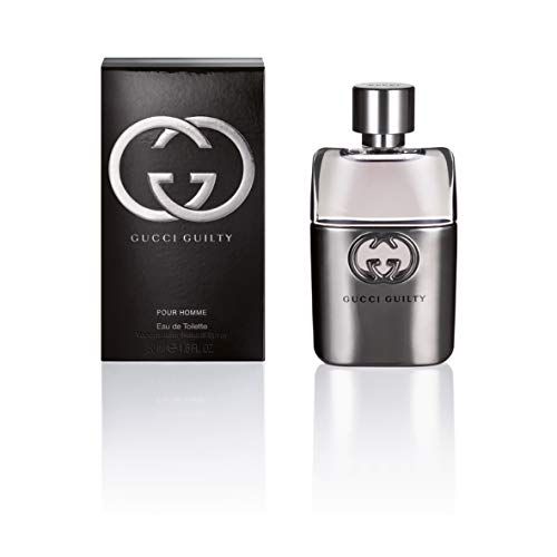 Flacone di Gucci Guilty Pour Homme Eau de Toilette Spray e confezione. Confezione nera con logo. Flacone argento con logo.
