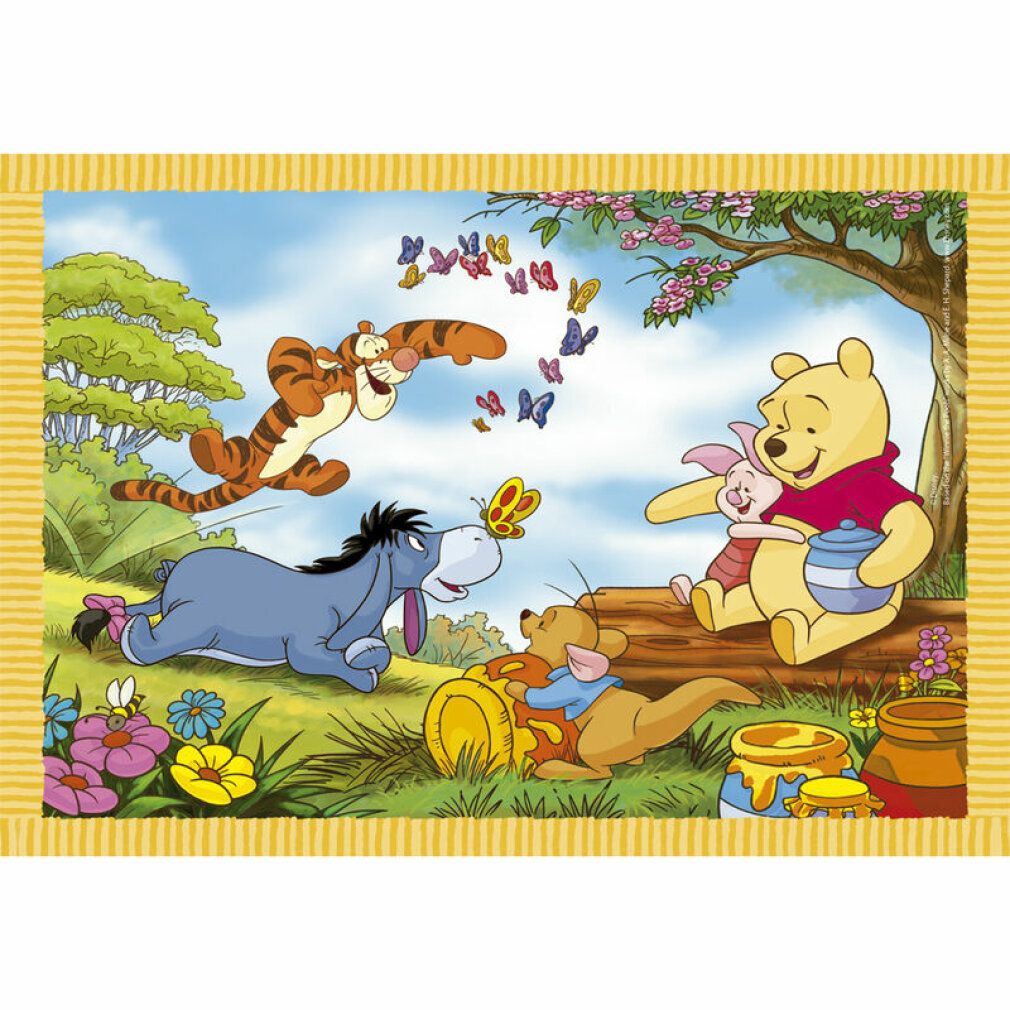 Pezzo di puzzle con Winnie the Pooh e amici. Cornice gialla. Scene con Tigro, Eeyore, Pimpi e Kanga. Farfalle colorate.