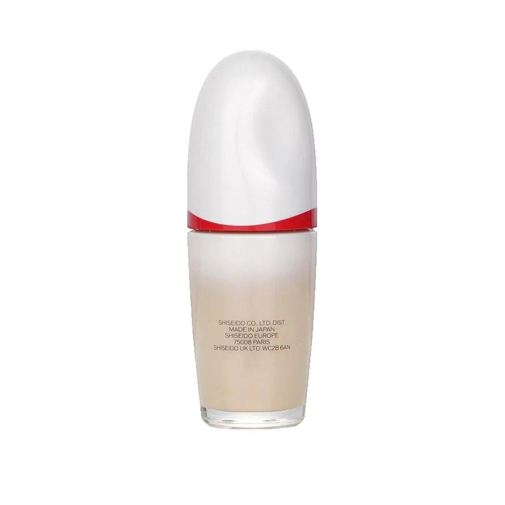 Fondotinta Shiseido Revitalessence Skin Glow, 30 ml. Flacone, retro. Tappo bianco, anello rosso. Testo: Shiseido Co. Ltd. Dist., Made in Japan.