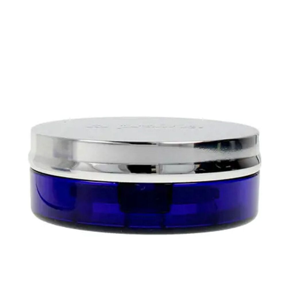 Fondotinta compatto aperto. Contenitore blu, coperchio argentato. Spugna e specchio visibili. Tonalità beige.