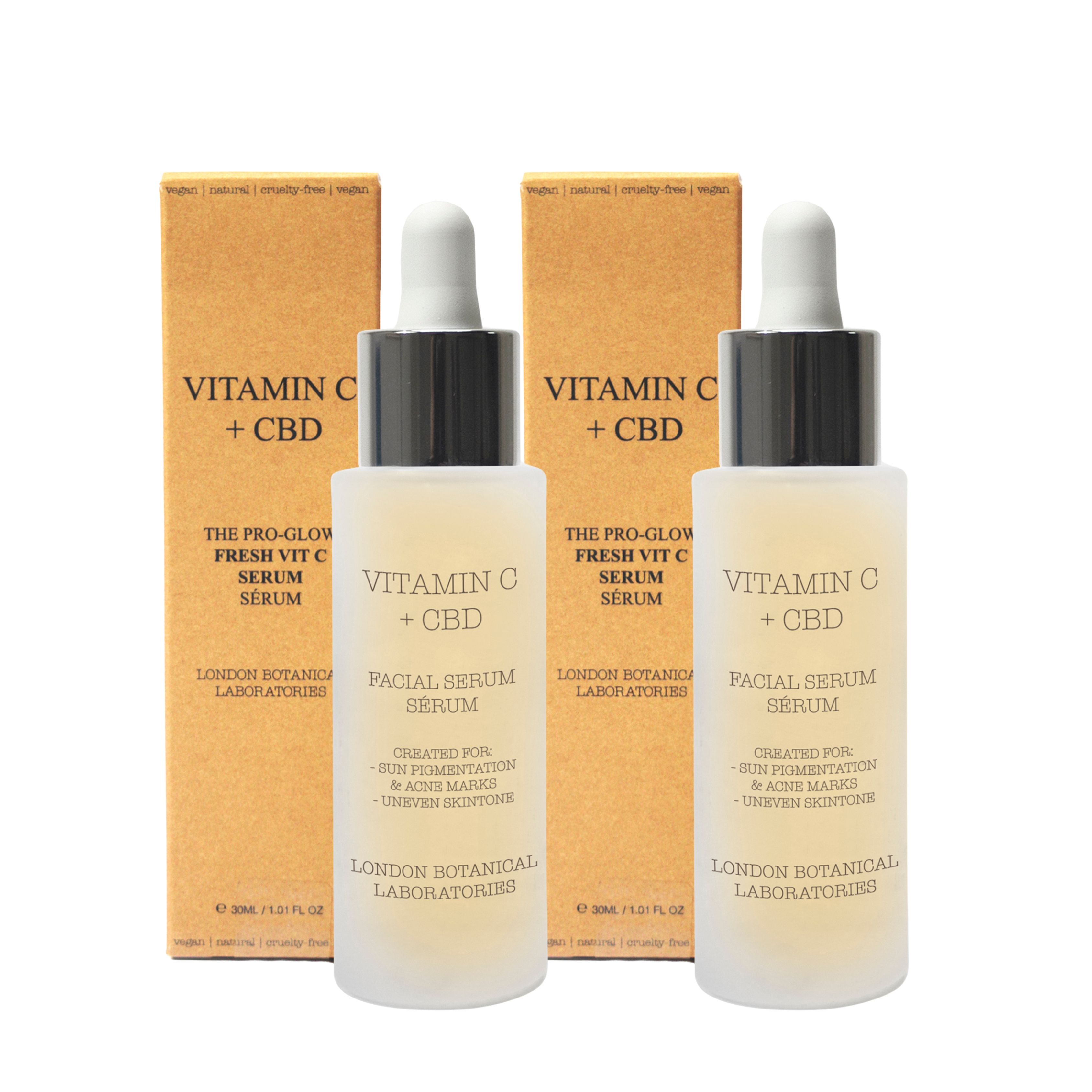 Due flaconi di siero con contagocce e due scatole. Scritta: Vitamin C + CBD. Marchio: London Botanical Laboratories. Testo: Siero.