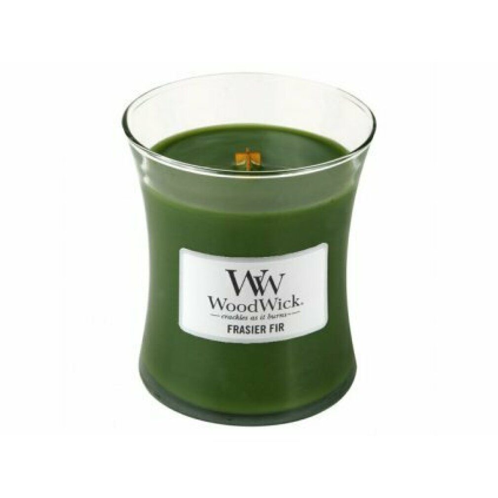 Candela a forma di clessidra con cera verde. L'etichetta riporta WoodWick e Frasier Fir. Contenitore di vetro con stoppino in legno.