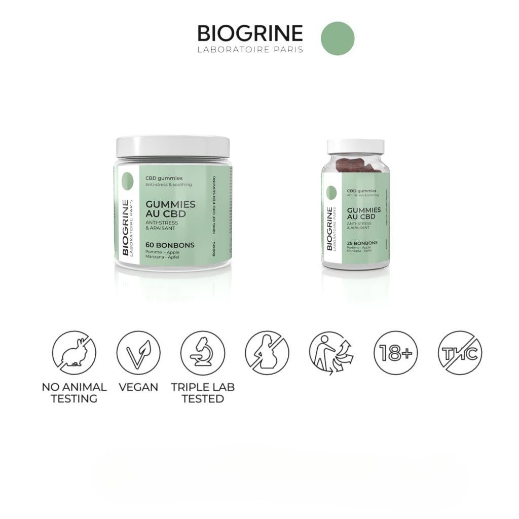 Due barattoli di caramelle gommose. Scritta: GUMMIES AU CBD. Loghi: Nessuna sperimentazione animale, Vegano, Testato in laboratorio, 18+, Senza THC. Marchio: BIOGRINE.