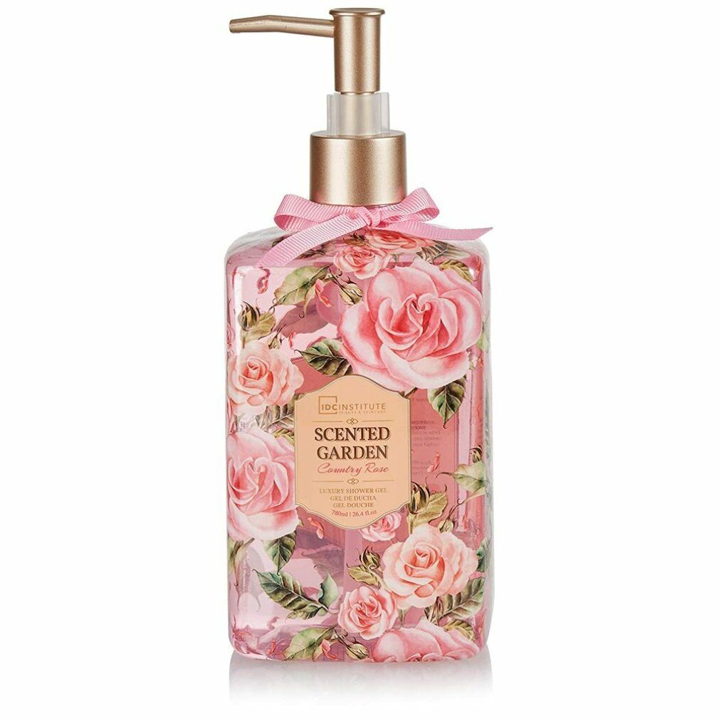Flacone trasparente con rose, dispenser dorato e fiocco rosa. Scritta: IDC INSTITUTE Scented Garden.