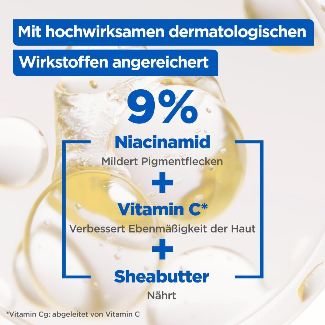 Primo piano di liquido con bolle. Testo: 9% Niacinamide, riduce le macchie pigmentarie + Vitamina C, migliora l'uniformità + Burro di Karité.