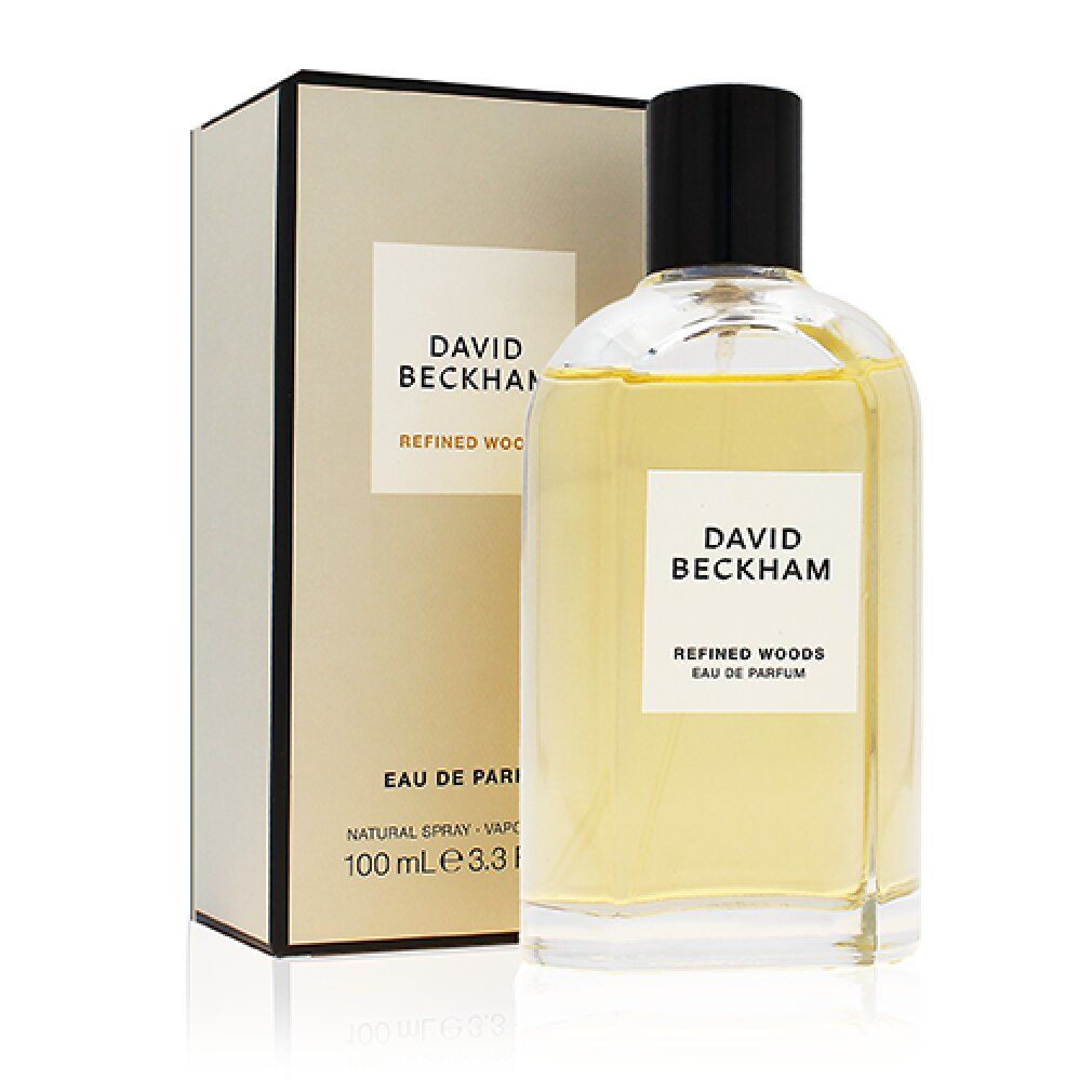 Flacone di profumo e confezione. Sul flacone: "DAVID BECKHAM REFINED WOODS EAU DE PARFUM". Sulla confezione: "DAVID BECKHAM".