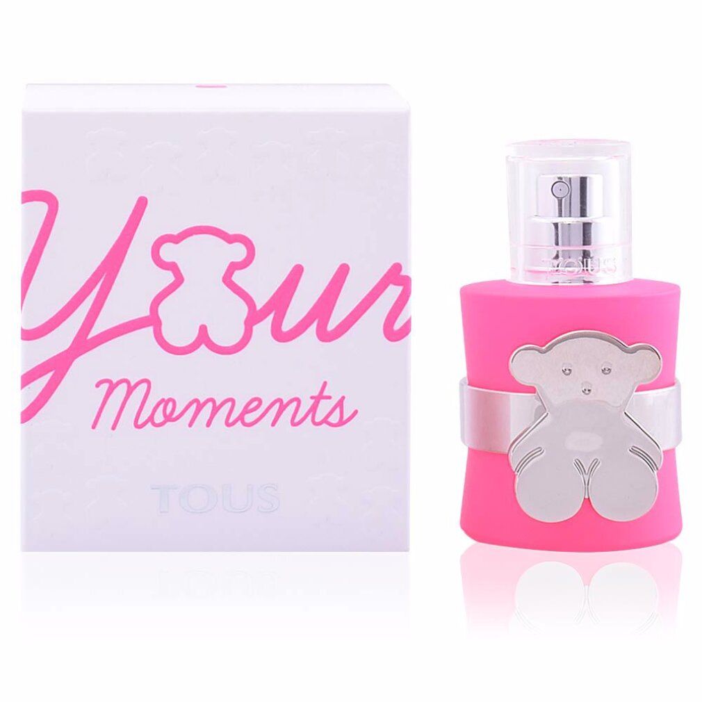 Flacone rosa con orsetto argentato e confezione bianca con scritta "Your Moments".