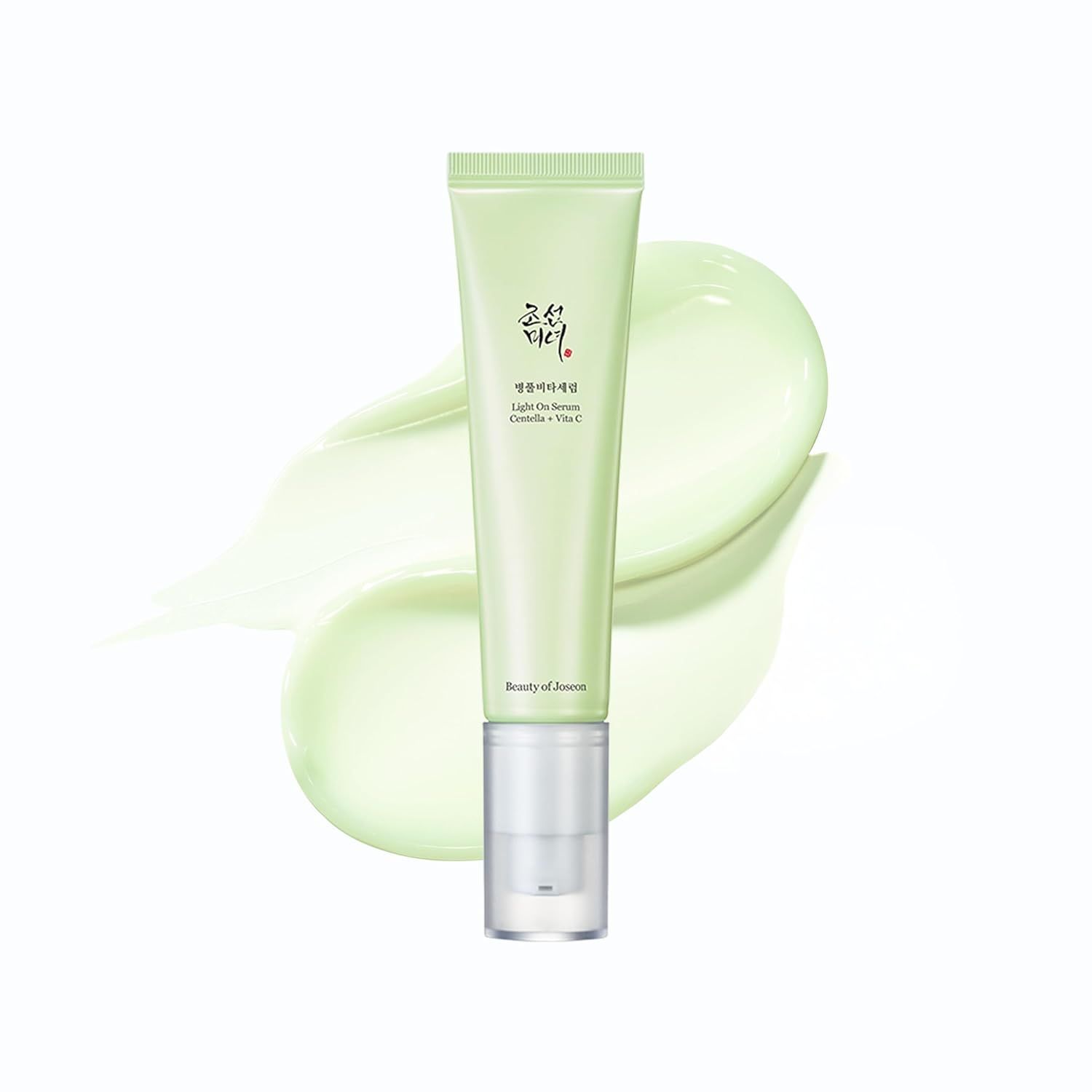 Tubo di siero verde con macchia di siero. Testo: Centella + Vita C. Marchio: Beauty of Joseon.