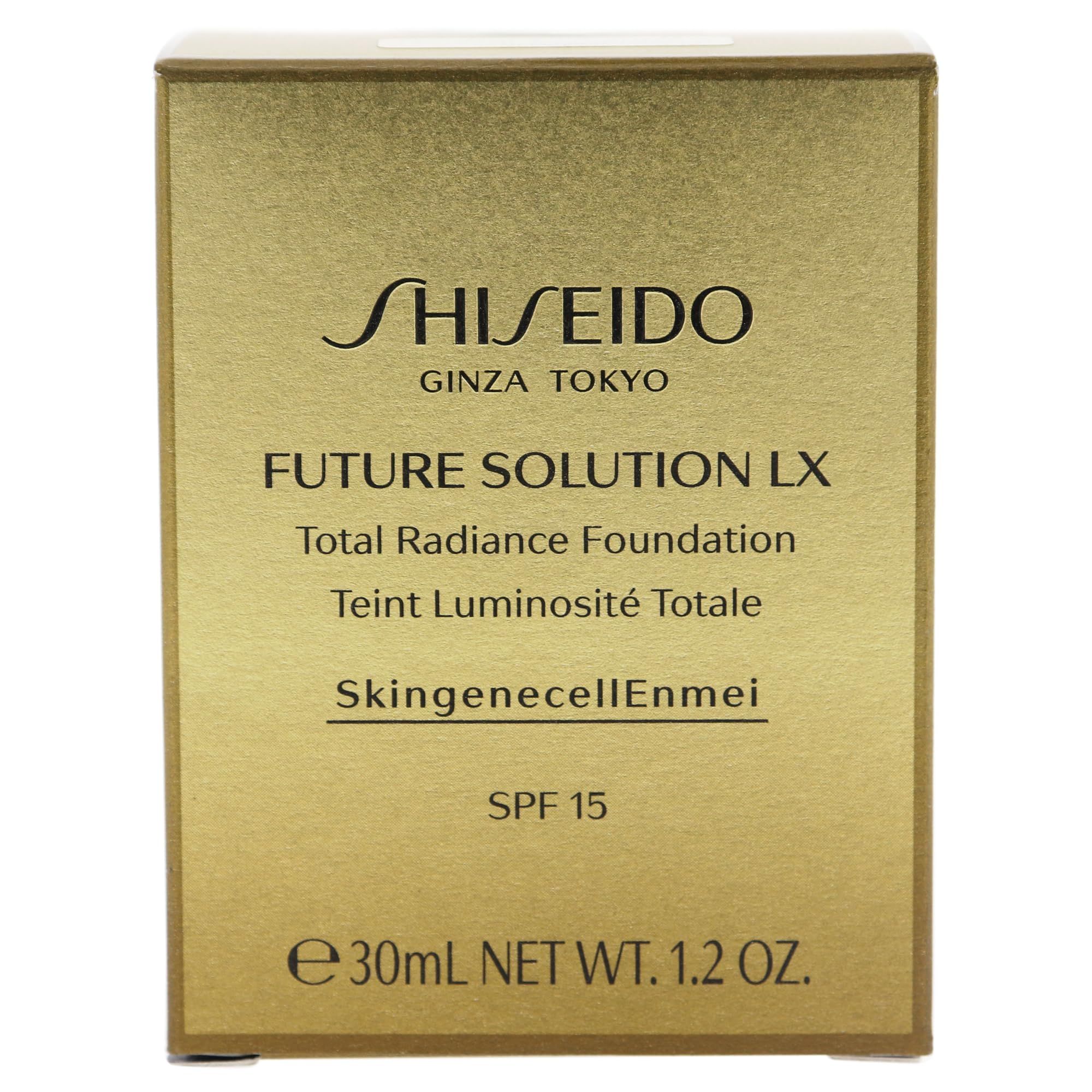 Scatola dorata con scritta: SHISEIDO, FUTURE SOLUTION LX, Total Radiance Foundation, SPF 15. Testo in inglese e francese.