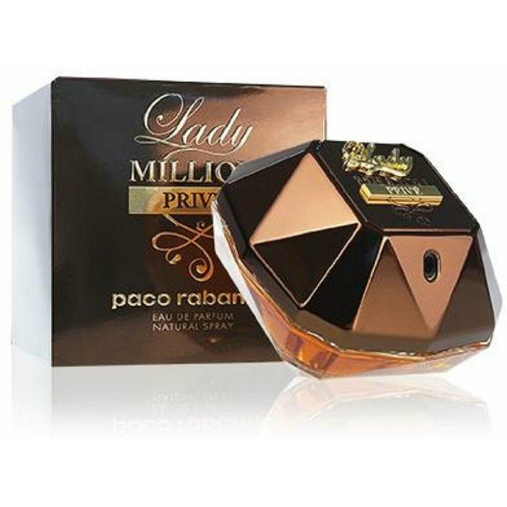 Flacone di profumo e confezione. Scritta: Lady Million Privé, Paco Rabanne. Flacone a forma di diamante, tappo dorato.