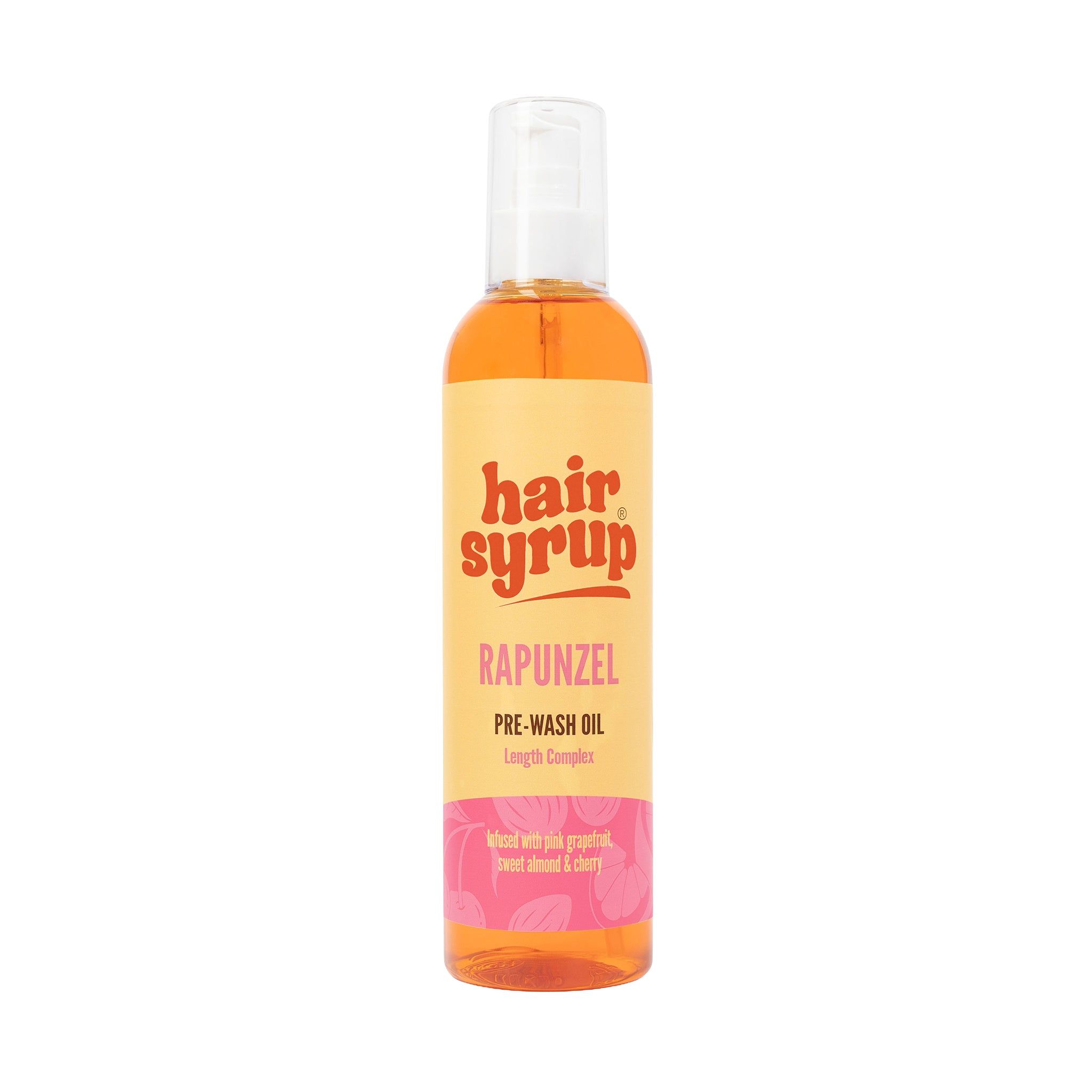 Bottiglia Hair Syrup Rapunzel Pre-Wash Oil. Liquido giallo, tappo bianco, etichetta rosa.