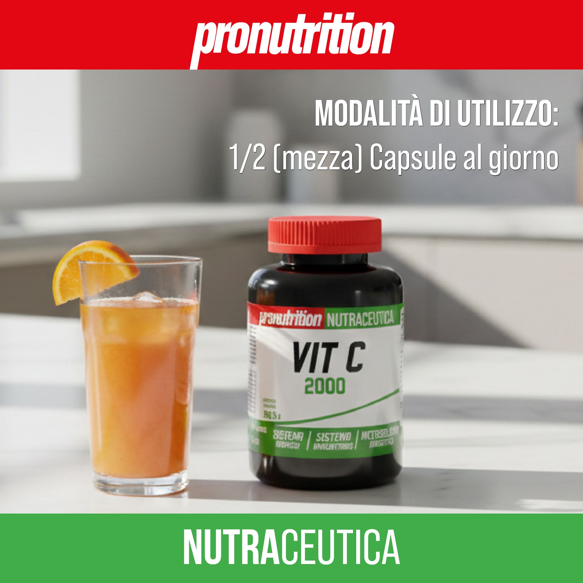 Flacone marrone con tappo rosso. Scritta: Vit C 2000. Accanto, bicchiere di succo d'arancia e fetta d'arancia.