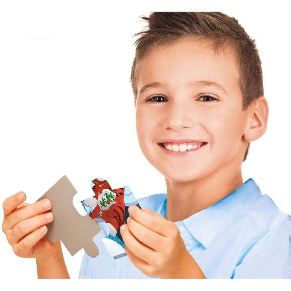 Ragazzo tiene un pezzo di puzzle con Tig. Accanto un altro pezzo di puzzle. Pezzo di puzzle con Tig.