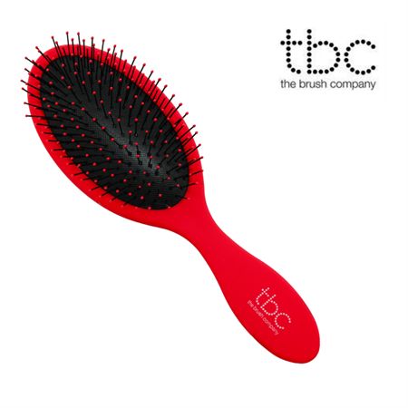 Spazzola per capelli TBC Wet & Dry rossa con setole nere, isolata.