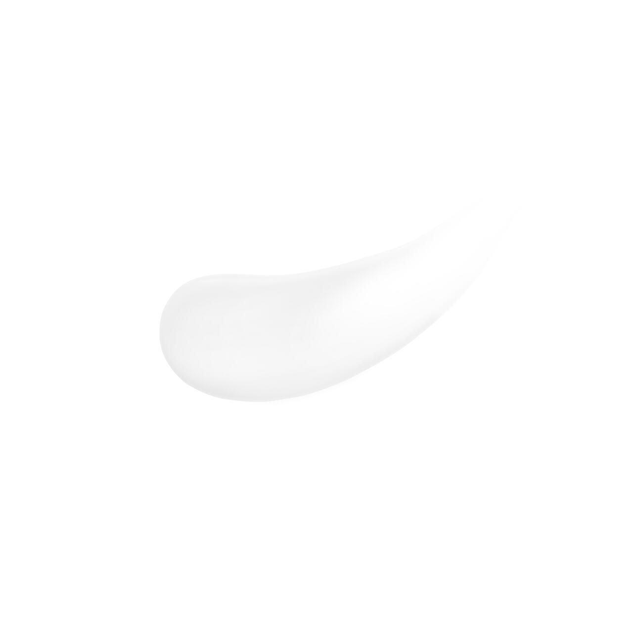 Macchia bianca di crema su sfondo bianco.