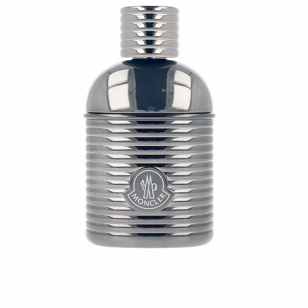 Flacone grigio scuro con superficie scanalata, logo Moncler. Tappo cilindrico. Scritta illeggibile.