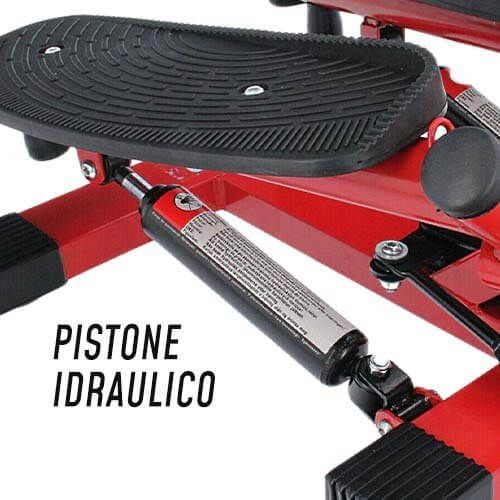 Primo piano di uno stepper rosso. Cilindro idraulico con testo: Pistone idraulico.