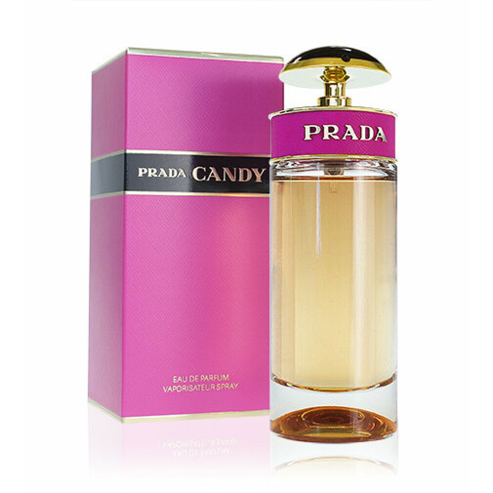 Scatola rosa e flacone. Sulla scatola: Prada Candy, scritta. Flacone: fascia rosa, tappo nero.