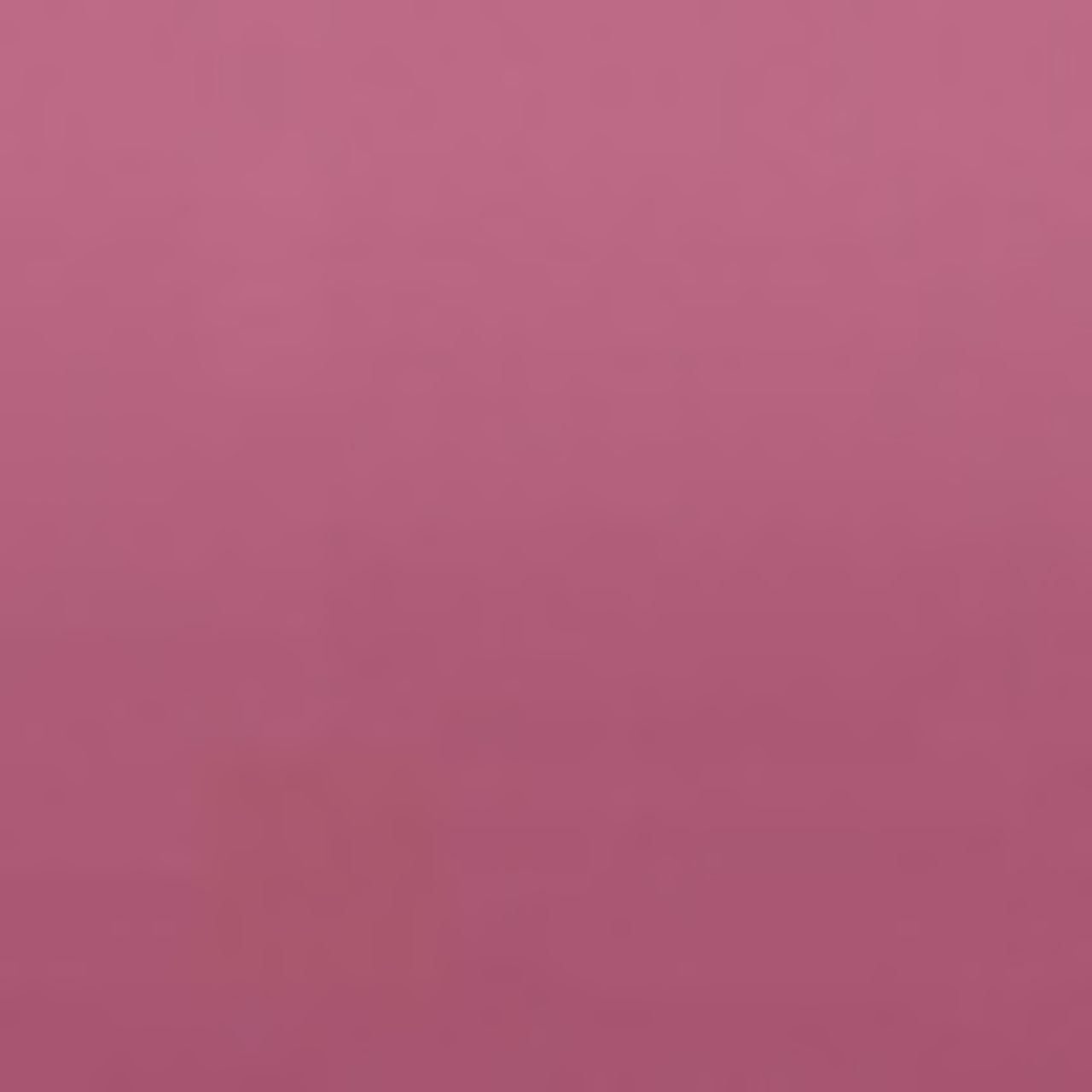 Sfondo rosa unito. Nessun prodotto o testo visibile.