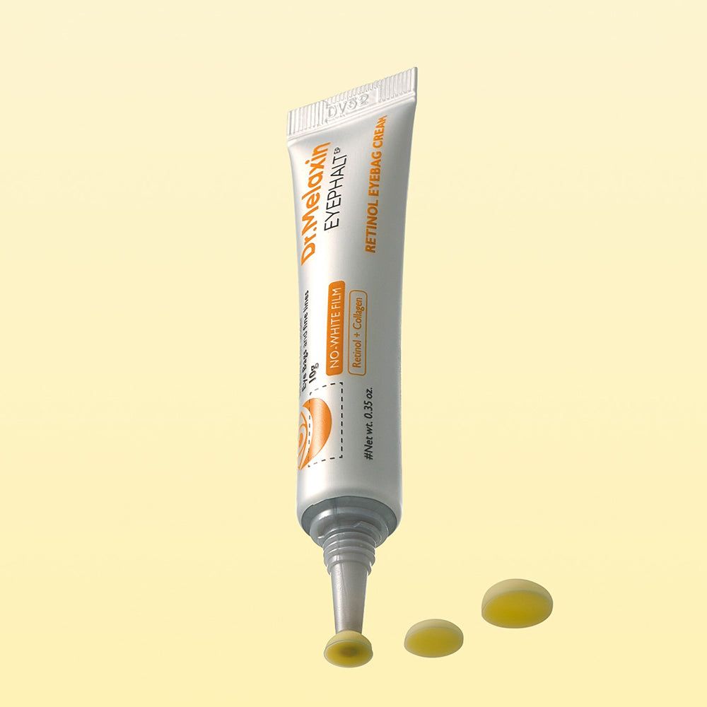 Tubo di crema contorno occhi Dr. Melaxin Retinol con applicatore e campioni.