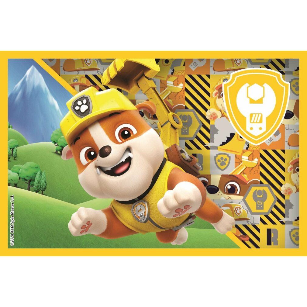 Rubble, un cucciolo bulldozer di Paw Patrol, indossa un casco e un giubbotto gialli. Vola davanti a un paesaggio montuoso e a un motivo di attrezzi.