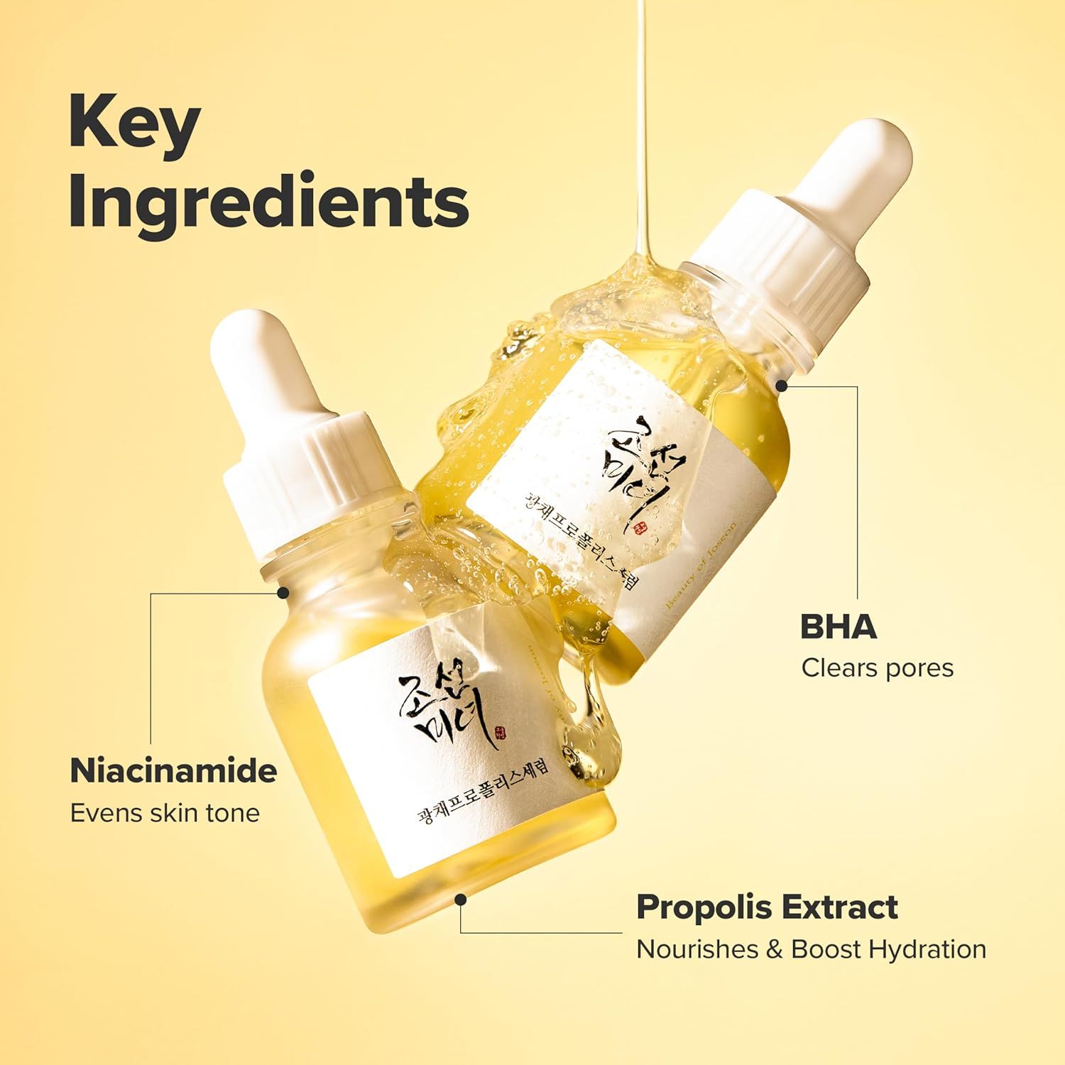 Due flaconi di siero con pipette. Testo: Niacinamide, BHA, estratto di propoli. Scritta: Beauty of Joseon.