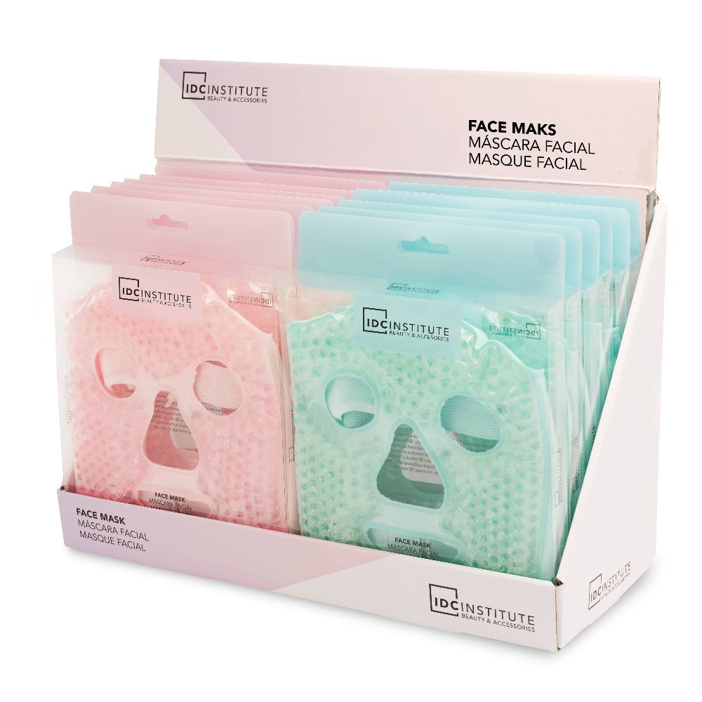 Espositore con maschere viso in gel rosa e verdi. Logo IDC INSTITUTE. Testo: Face Mask. Confezionato in plastica.