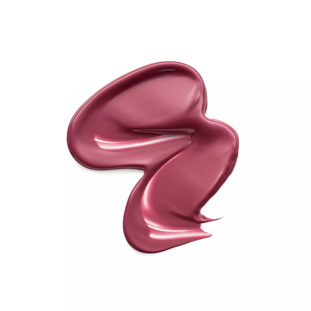 Goccia di rossetto liquido rosa su sfondo bianco. Texture lucida.