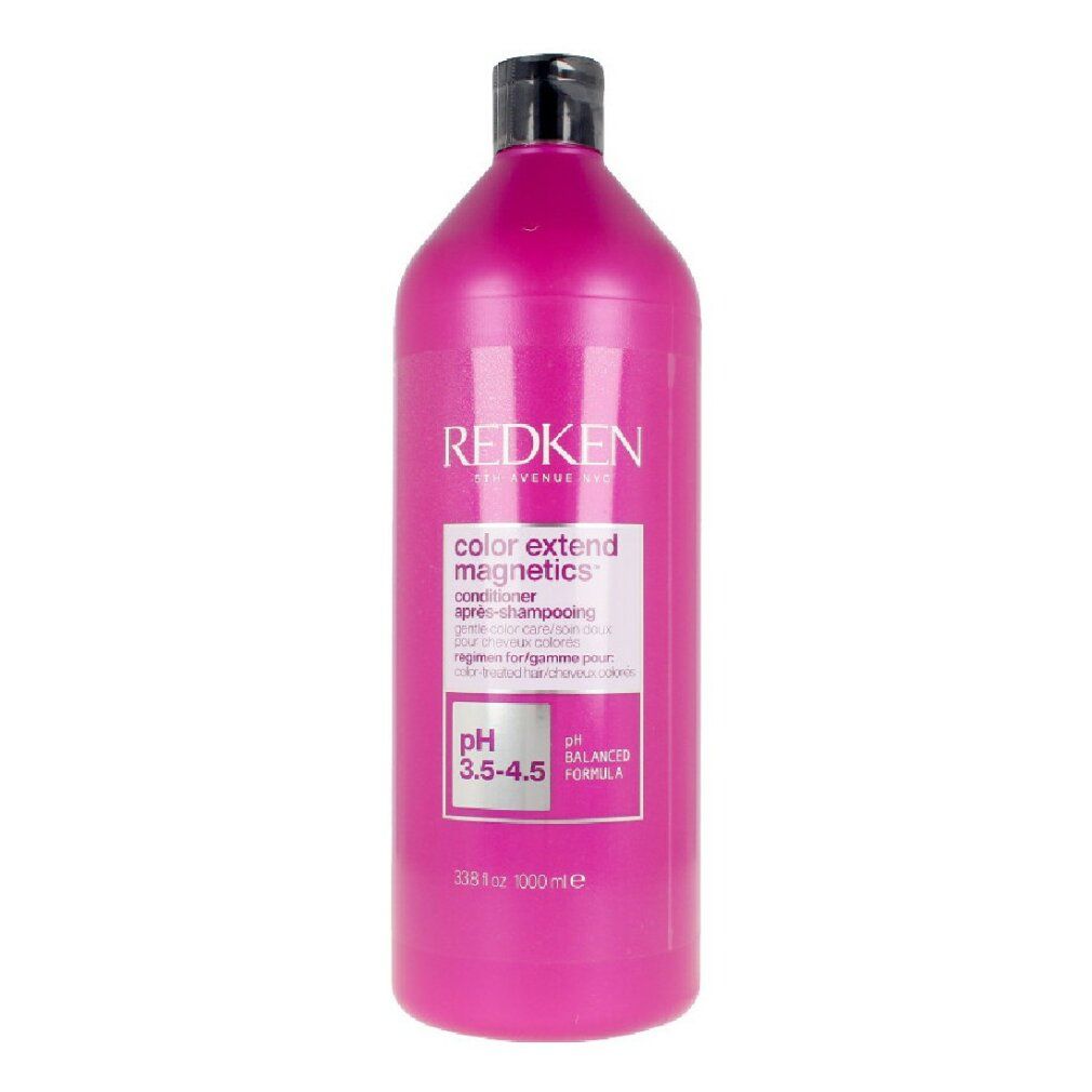 Flacone di balsamo rosa con tappo nero. Scritta: Redken, color extend magnetics, pH 3.5-4.5.