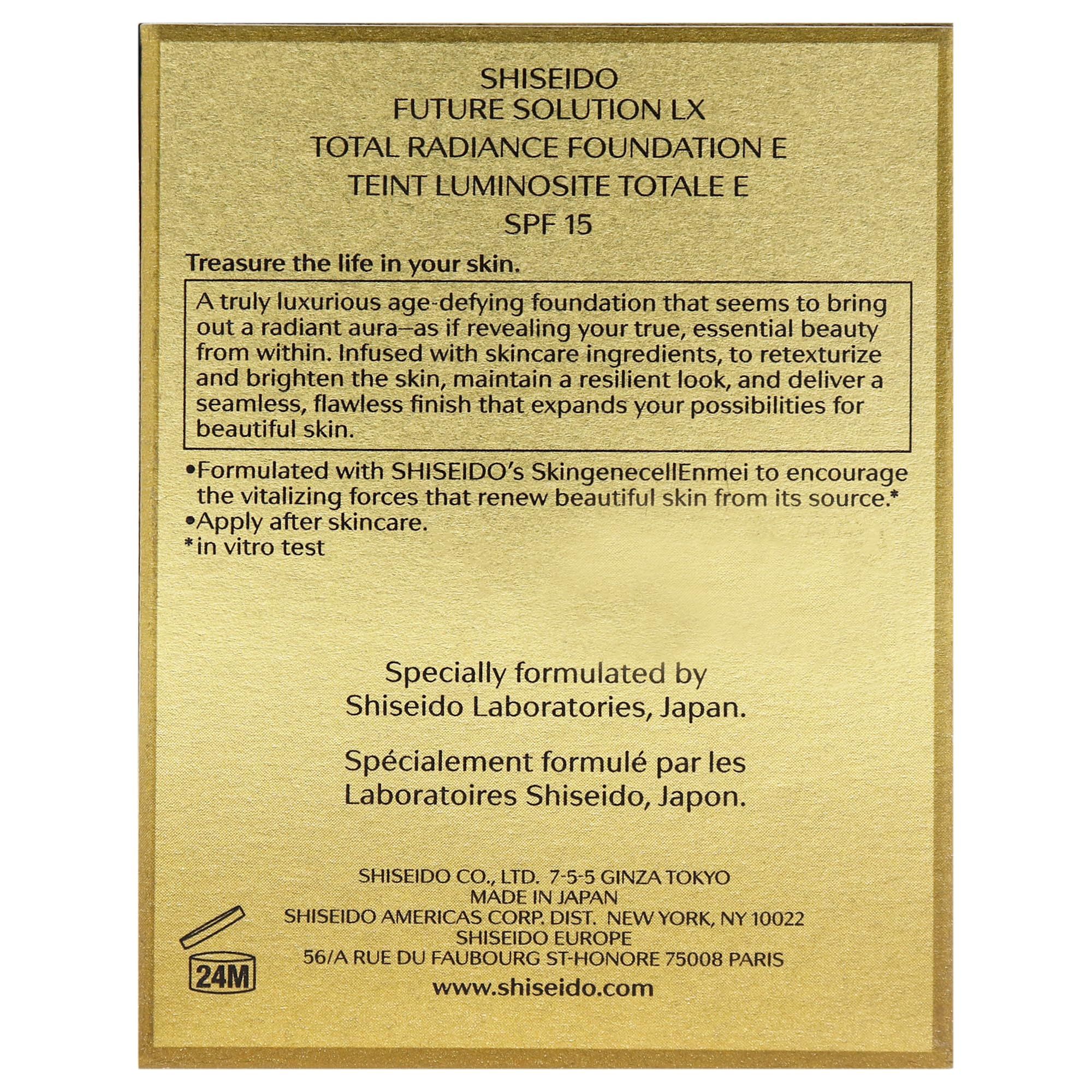 Retro della scatola dorata con informazioni sul prodotto. Testo sul fondotinta e sugli ingredienti.