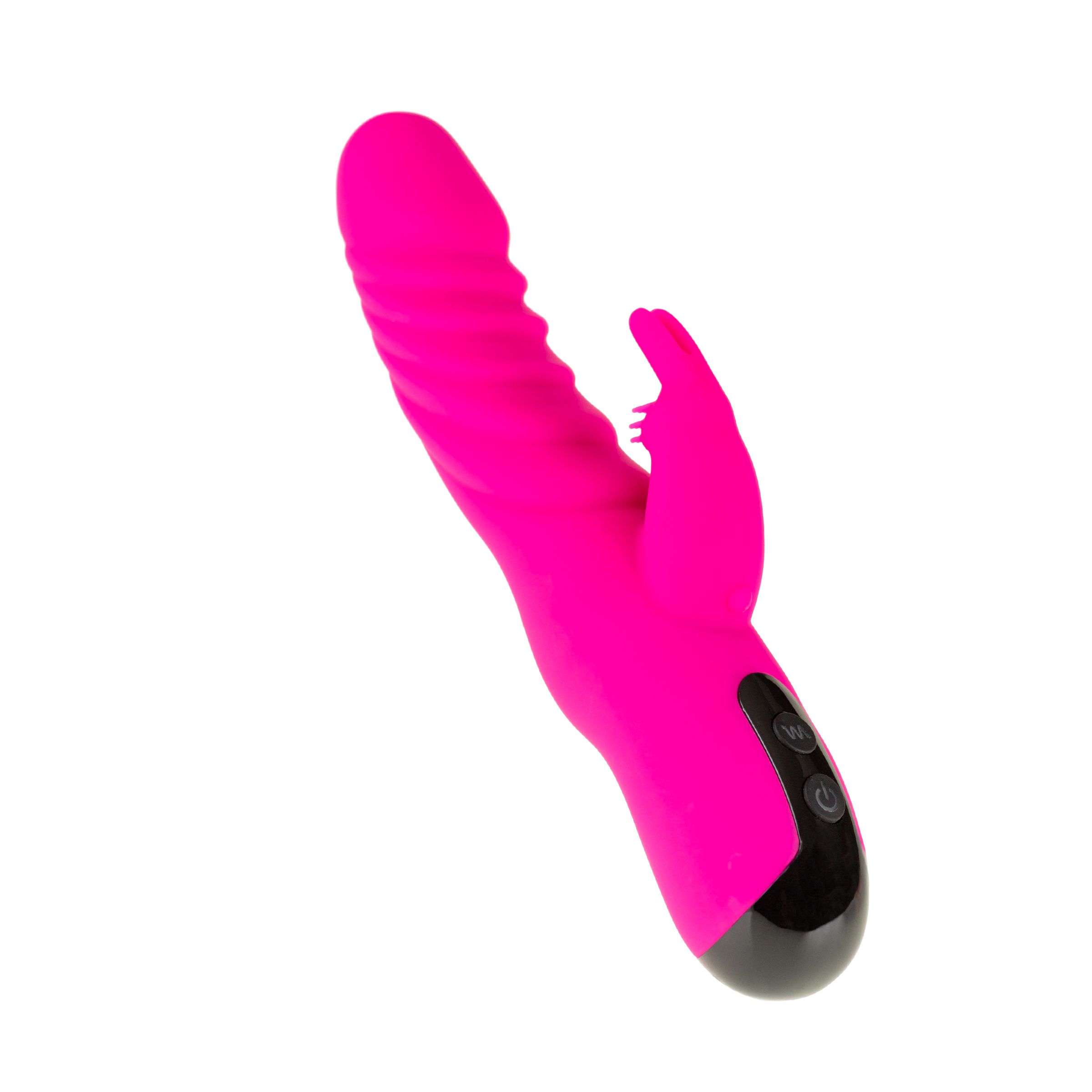 Vibratore fucsia con superficie scanalata e impugnatura. Comandi neri.
